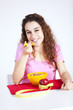Young woman eating cereals