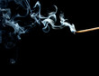 match with abstract smoke on black background