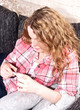 Young woman is lying on the couch Young woman is lying on the couch