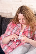 Young woman is lying on the couch Young woman is lying on the couch