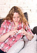 Young woman is lying on the couch Young woman is lying on the couch