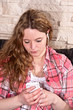 Sitting on the couch while listening to music Sitting on the couch while listening to music