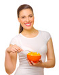 Young girl with fruit salad