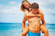 Photo: Young Couple on Tropical Beach Young Couple on Tropical Beach