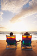 Happy Romantic Couple Enjoying Beautiful Sunset at the Beach