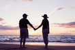 Senior Couple Enjoying Sunset at the Beach