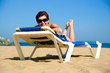 Foto: beautiful girl lying on a lounger beautiful girl lying on a lounger