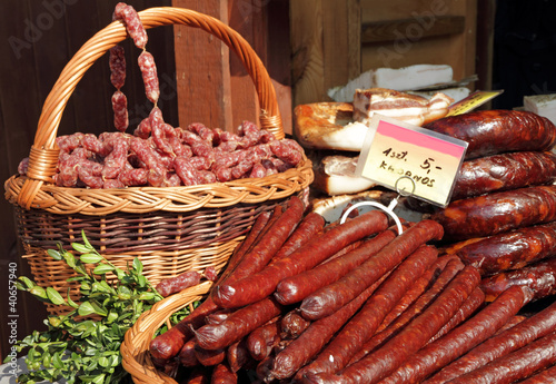 Photo: sausages for sale on food market in Krakow, Poland, Europe sausages for sale on food market in Krakow, Poland, Europe