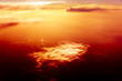 Red sky, sunset and clouds. Flying over Clouds Red sky, sunset and clouds. Flying over Clouds