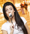 woman holding a spoon woman holding a spoon
