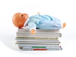 Puppe und Bücher