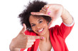 Photo: Beautiful african american woman making frame with her hands Beautiful african american woman making frame with her hands