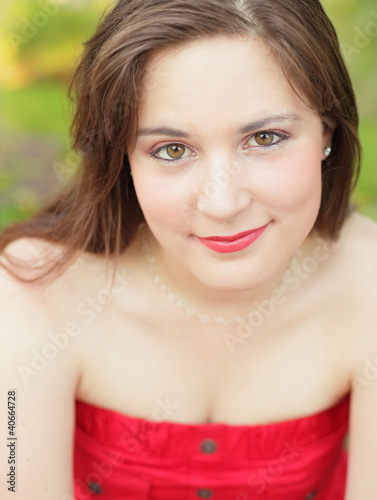 Foto: Young woman smiling Young woman smiling
