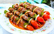 Raw barbecue spits ready for the grill.