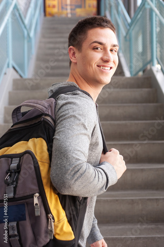 Photo: young male college student with backpack young male college student with backpack