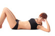 Young woman doing fitnes training isolated on white background