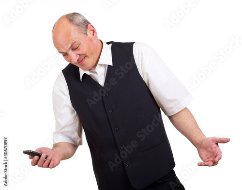 Photo: ahnungsloser Geschäftsmann mit Telefon in der Hand ahnungsloser Geschäftsmann mit Telefon in der Hand