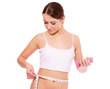 Athletic woman with measure tape