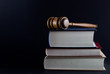 Gavel Atop Legal Texts Gavel Atop Legal Texts
