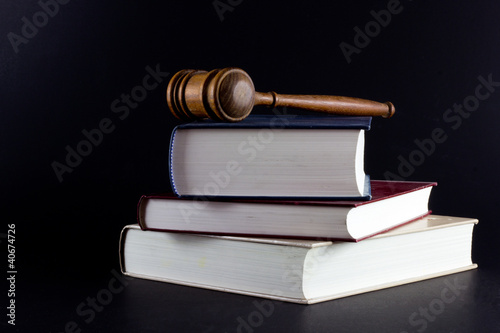 Photo: Gavel Atop Legal Texts Gavel Atop Legal Texts