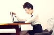 work stress, female model full make-up working on laptop. work stress, female model full make-up working on laptop.