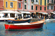 Red boat in the port of Portofino, Italy