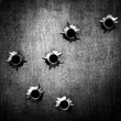 metal with bullet hole