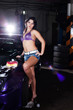 beautiful girl washes the car