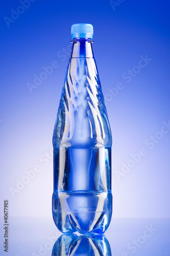 Photo: Water bottles as healthy drink concept Water bottles as healthy drink concept