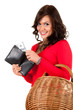 smiling shopping girl keeping wallet with dollars