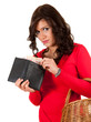 sad young woman looking to the wallet with euro