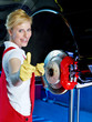 Apprentice shows thump up after learning to fix a brake