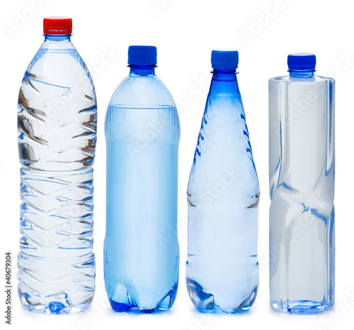 Photo: Many water bottles isolated on white Many water bottles isolated on white