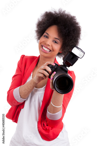 Photo: Young african american photographer with camera Young african american photographer with camera