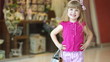 Closeup portrait of a little girl laughing in the shop