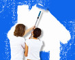 Young couple with paint brushes together