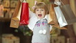 I love shopping. Little girl in the shop.
