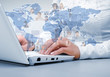 Laptop against technology background