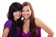 Photo: Two young women in violet dresses Two young women in violet dresses