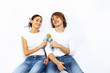 Young couple with paint brushes together
