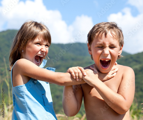 Photo: Children are swearing to each other Children are swearing to each other