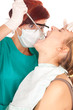 young woman on dental visit, white background