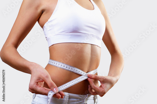 Foto: Young pretty woman in sport wear Young pretty woman in sport wear