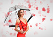 Pretty young woman with umbrella and hearts