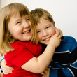 Photo: Brother and sister hugging eacch other Brother and sister hugging eacch other