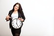 Young Employee Holding a Clock