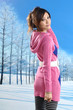 fashion asian girl posing in winter park