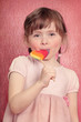 Little girl with lollipop Little girl with lollipop