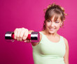 Foto: woman with a dumbbell woman with a dumbbell