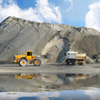 Excavator and truck in mine.
